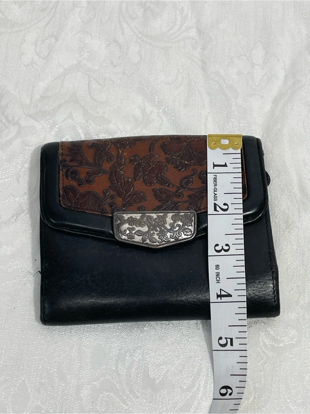 Brighton Vintage Tooled Leather Bifold Wallet in Black and Brown.